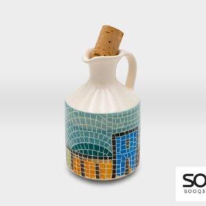 قارورة مع سدادة مع يد مشغولات خزفية قرية 