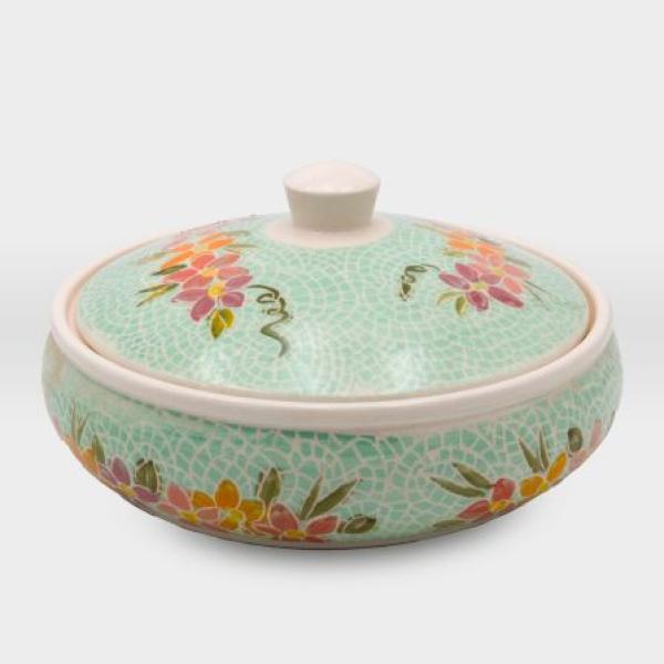 مضيفة مشغولات خزفية ورود وزهور