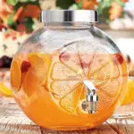 موزع عصائر ومشروبات زجاجي بتصميم "الليمون"