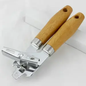 فتاحة علب يدوية بمقابض خشبية