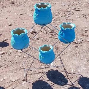 ستاند مع قواوير لزراعة