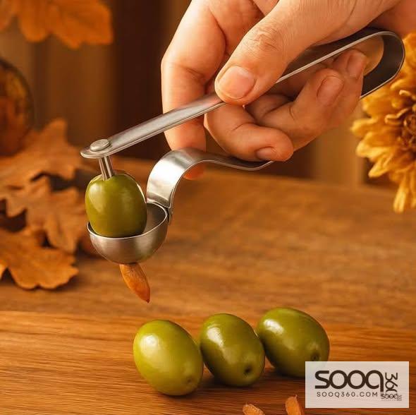 أداة إزالة نوى الزيتون والتمر والكرز