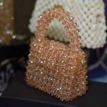 شنطة خرز حجم صغير لون بني