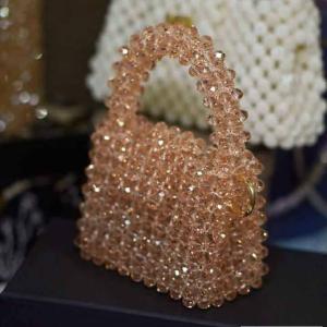 شنطة خرز حجم صغير لون بني