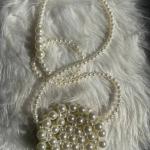 شنطة خرز لولي دائرية حجم صغير