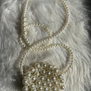 شنطة خرز لولي دائرية حجم صغير