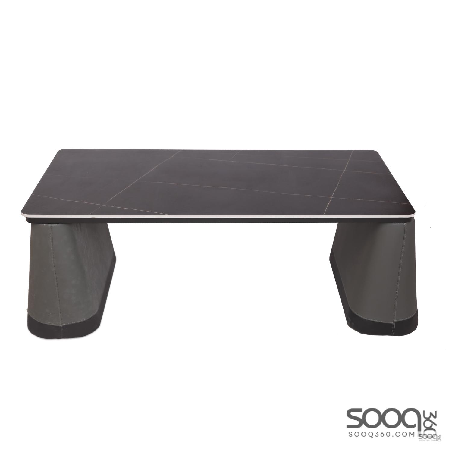 طاولة وسط رخام صناعي لون اسود 120x60سم قاعدة جلد مطرز بني